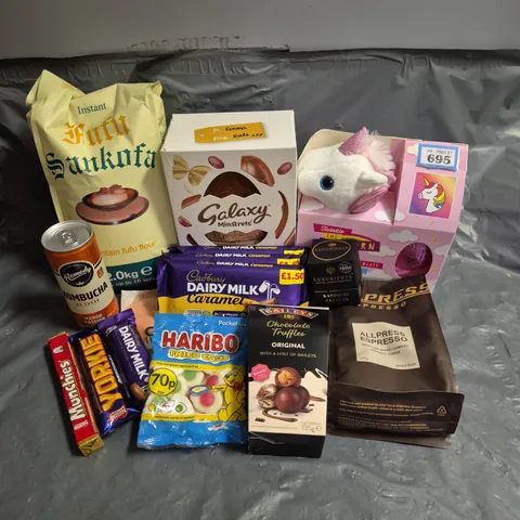 APPROXIMATELY 15 ASSORTED FOOD AND DRINK PRODUCTS TO INCLUDE - GALAXY MINSTRELS EGG - CADBURY CARAMEL DAIRY MILK - SANKOFA FUFU POWDER - ETC