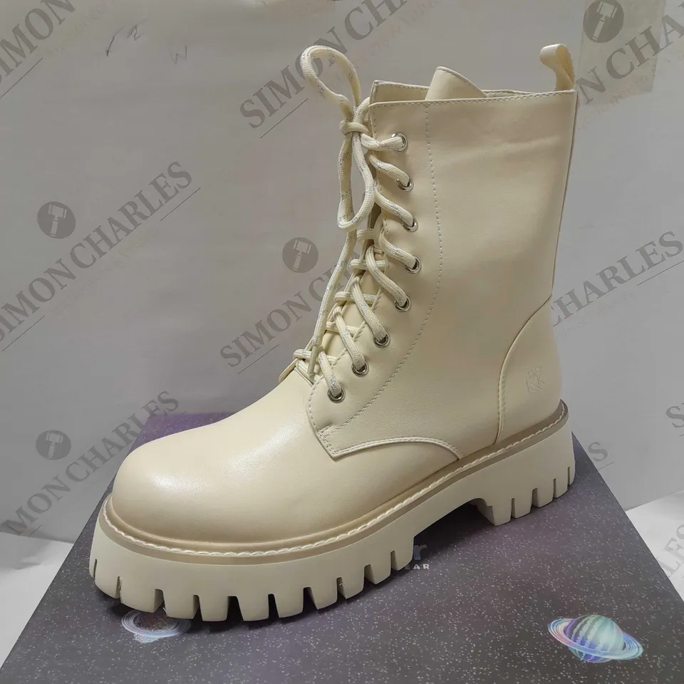 KOI THE VOICES ARE ME BEIGE BOOTS - SIZE 6