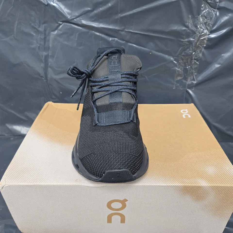 BOXED PAIR OF ON CLOUDNOVA TRAINERS IN BLACK ECLIPSE - UK 8