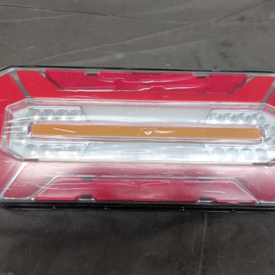 APPROXIMATELY 6 BOXED VTA-05 REAR TAIL LIGHTS