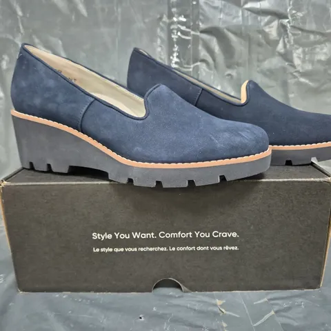 BOXED PAIR OF VIONIC WEDGE SLIP ON SHOES IN NAVY SIZE 6