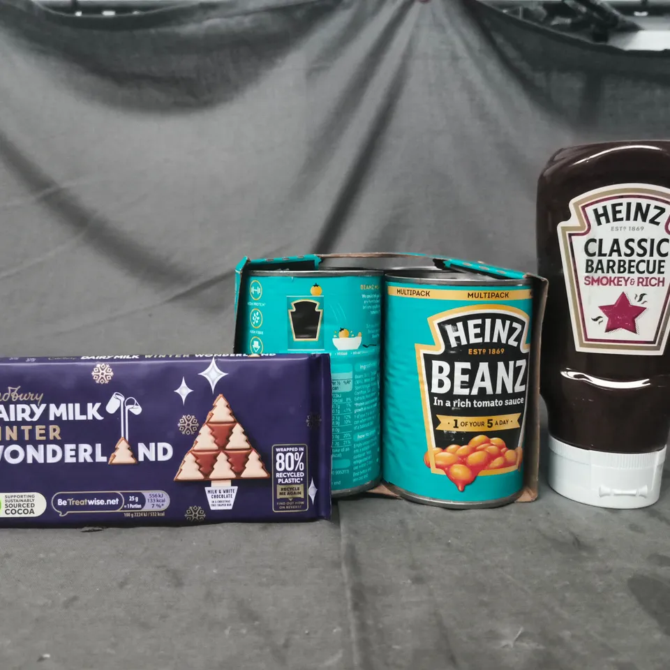 APPROXIMATELY 10 ASSORTED FOOD AND DRINK ITEMS TO INCLUDE DAIRY MILK, HEINZ BEANS, ETC