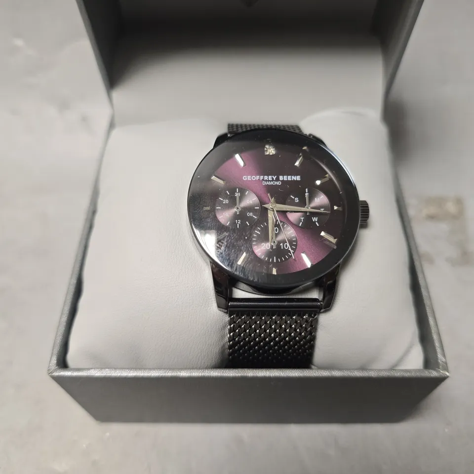 BOXED GEOFFERY BEENE PURPLE DIAL CHRONOGRAPH WATCH 