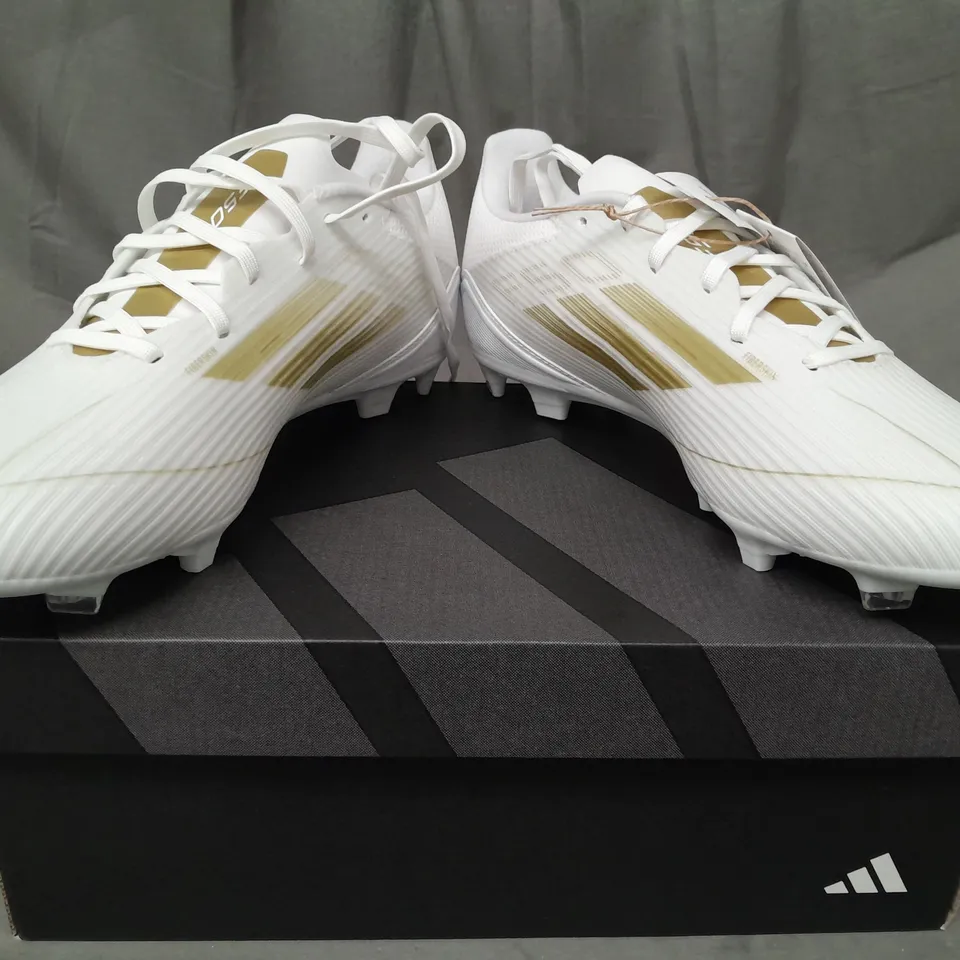 BOXED PAIR OF ADIDAS F50 LEAGUE FOOTBALL BOOTS IN WHITE/GOLD UK SIZE 8