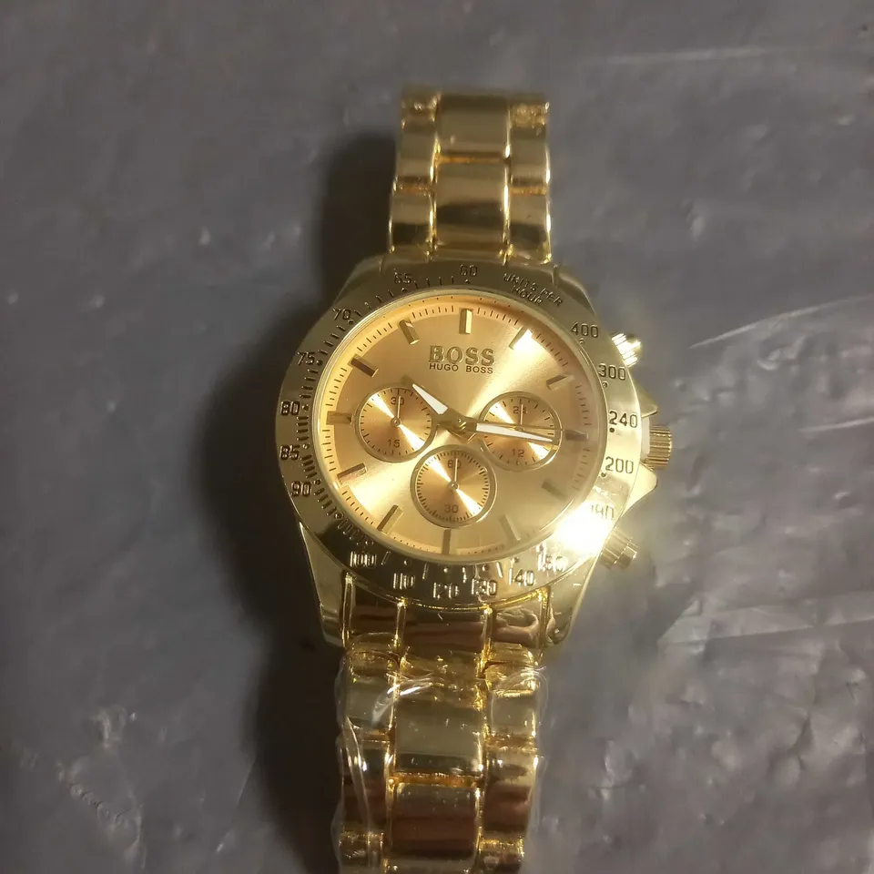 HUGO BOSS STAINLESS STEEL 10 ATM 6795 WATCH IN GOLD